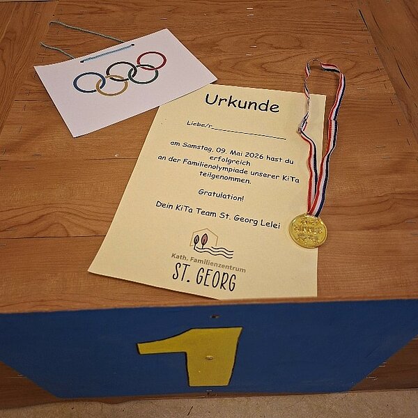 Urkunde und Medaille