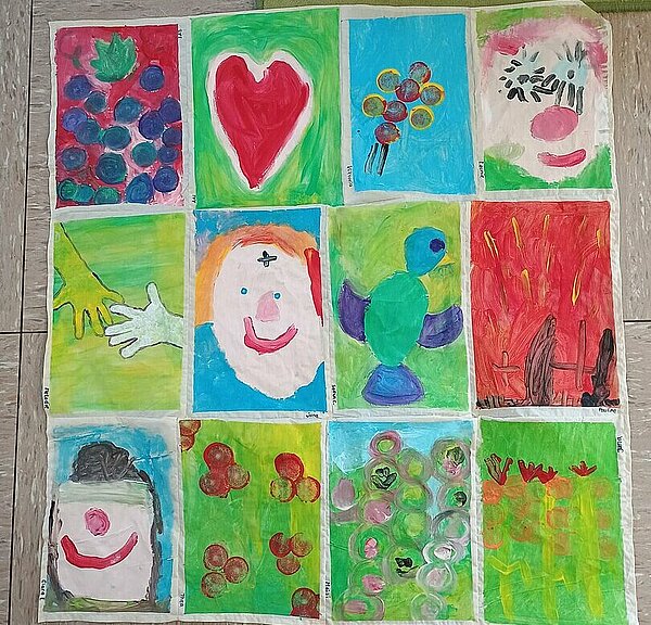 Bunte selbst gestaltete Fastendecke aus Bildern
